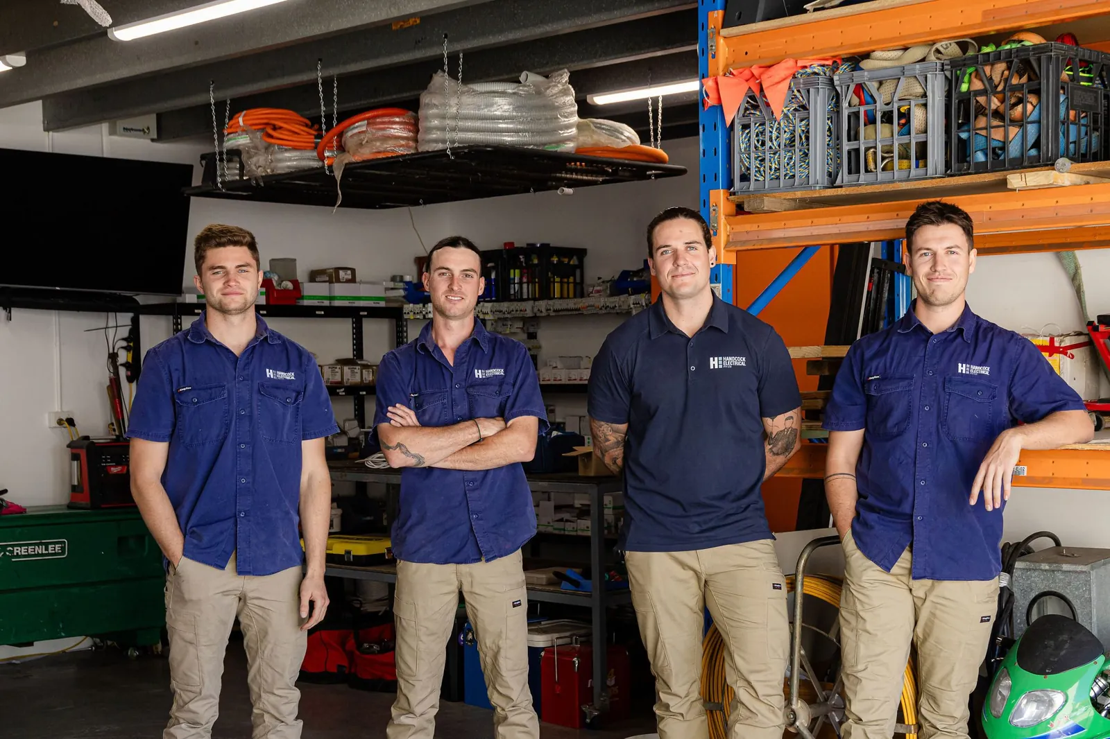 Four of the Handcock Electrical team in the workshop