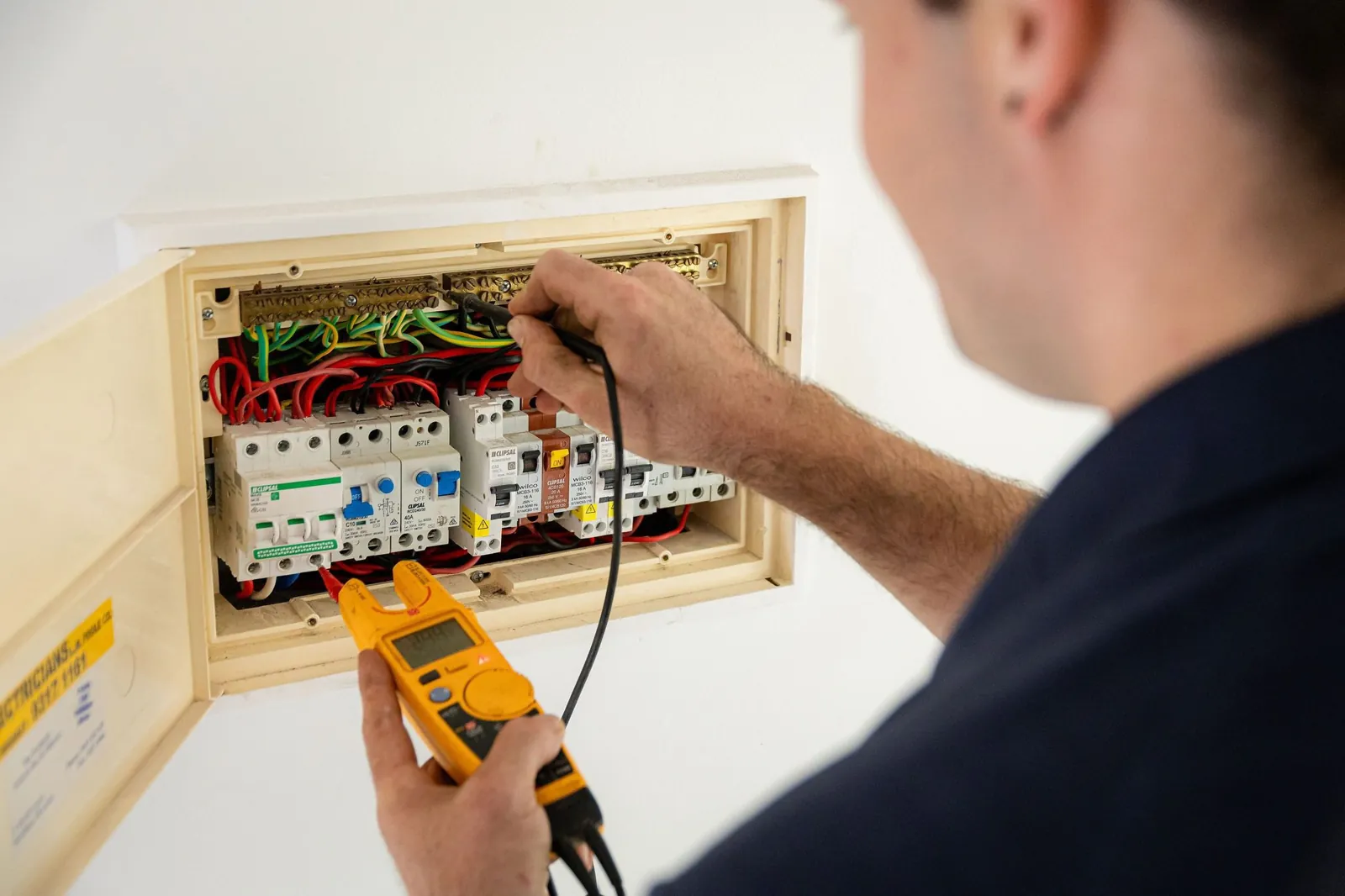 Testing a home switchboard with a clamp meter