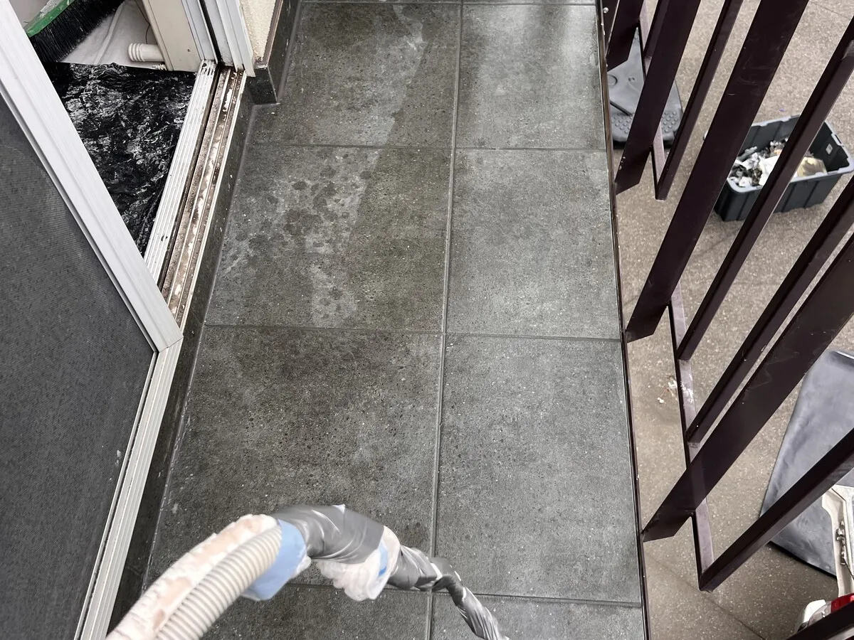 The balcony after tiling in charcoal outdoor tiles