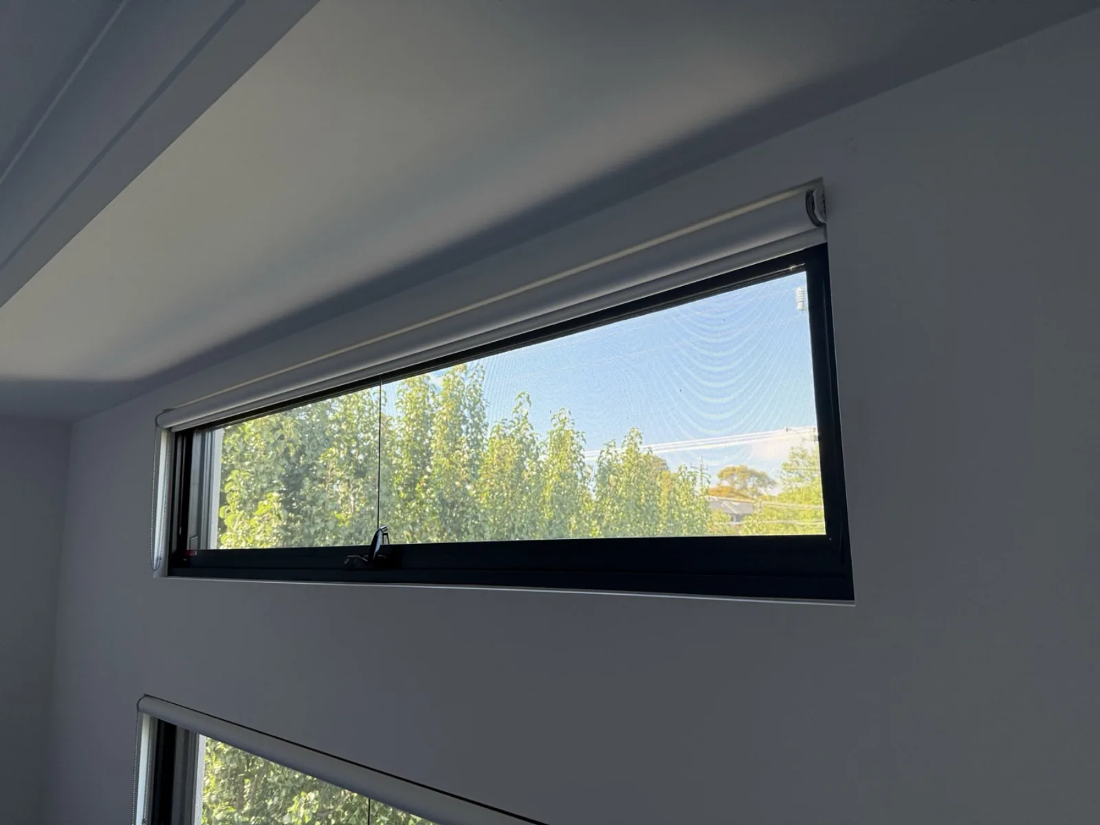 New black-framed window by JT Handyman in Brighton East