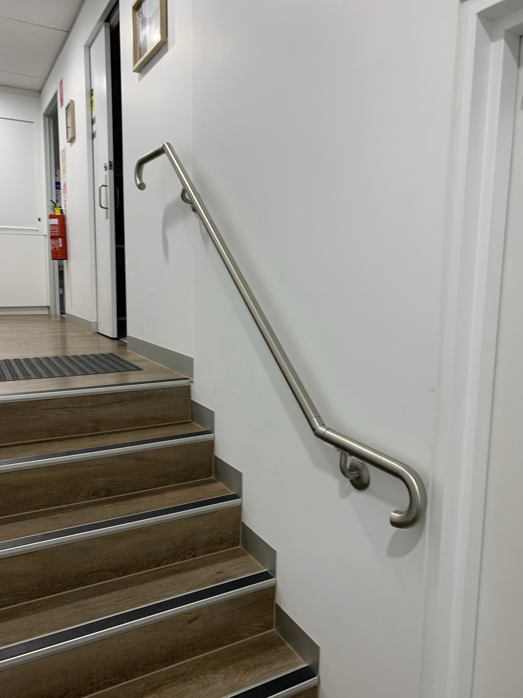 Stainless steel stair handrail by JT in South Yarra