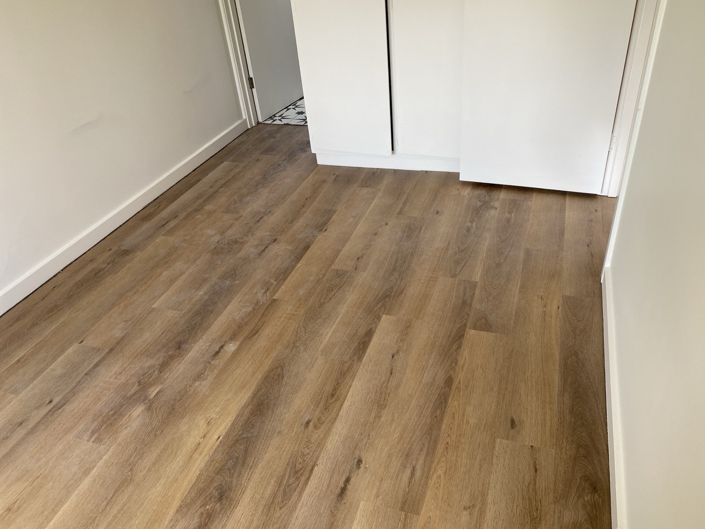 Timber-look flooring by JT Handyman in Brighton East, VIC