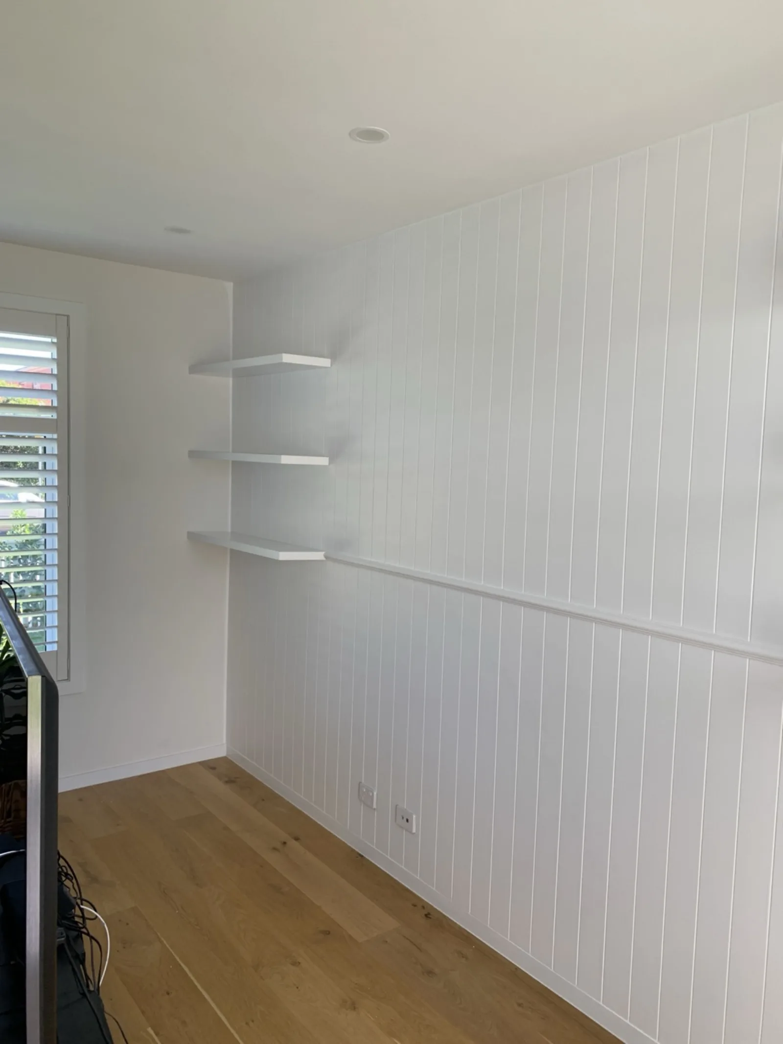 VJ panelling wall with floating shelves by JT Handyman in Pascoe Vale