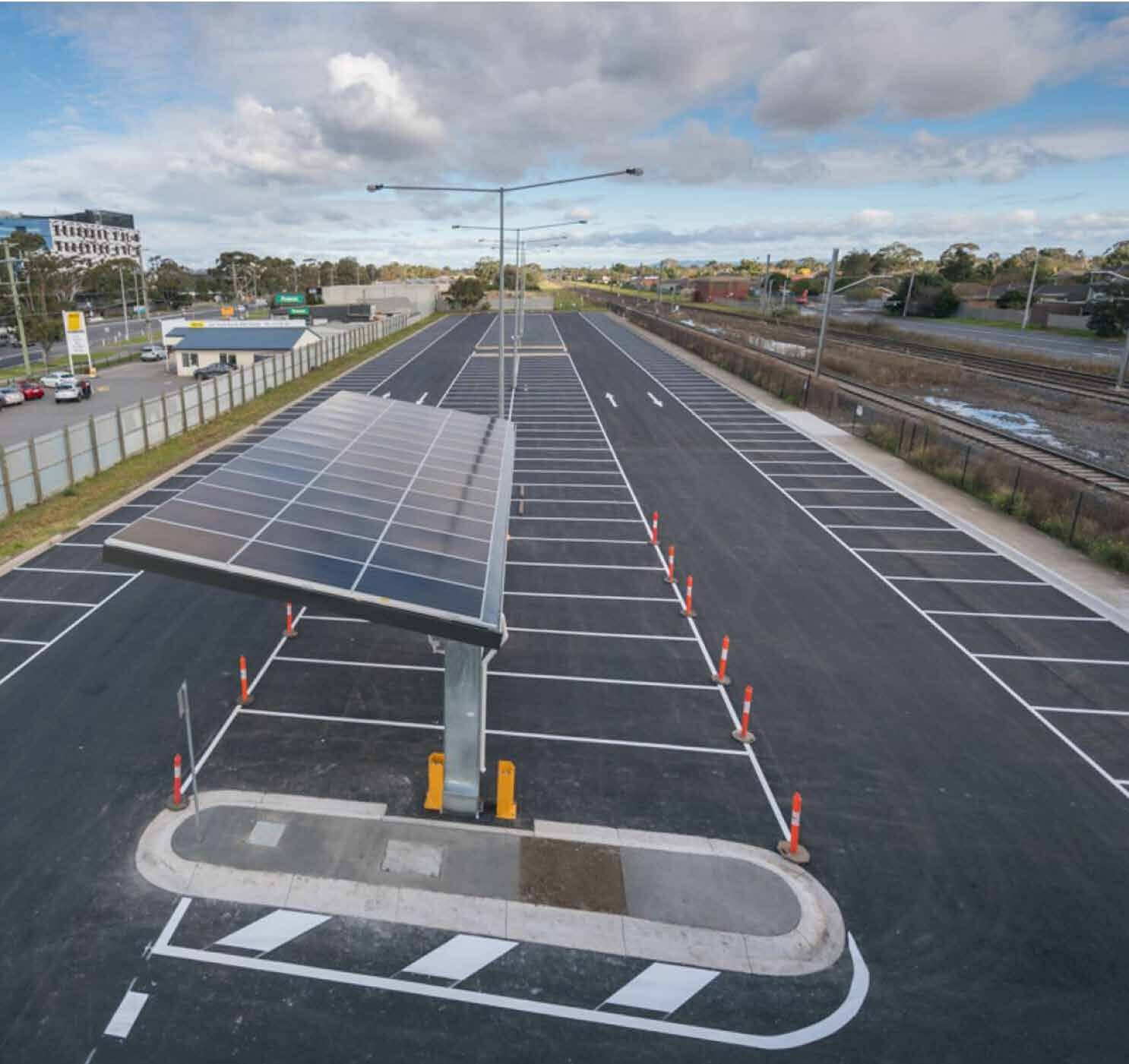QCS completed commuter car park, kerbing, drainage and line marking beside a rail corridor