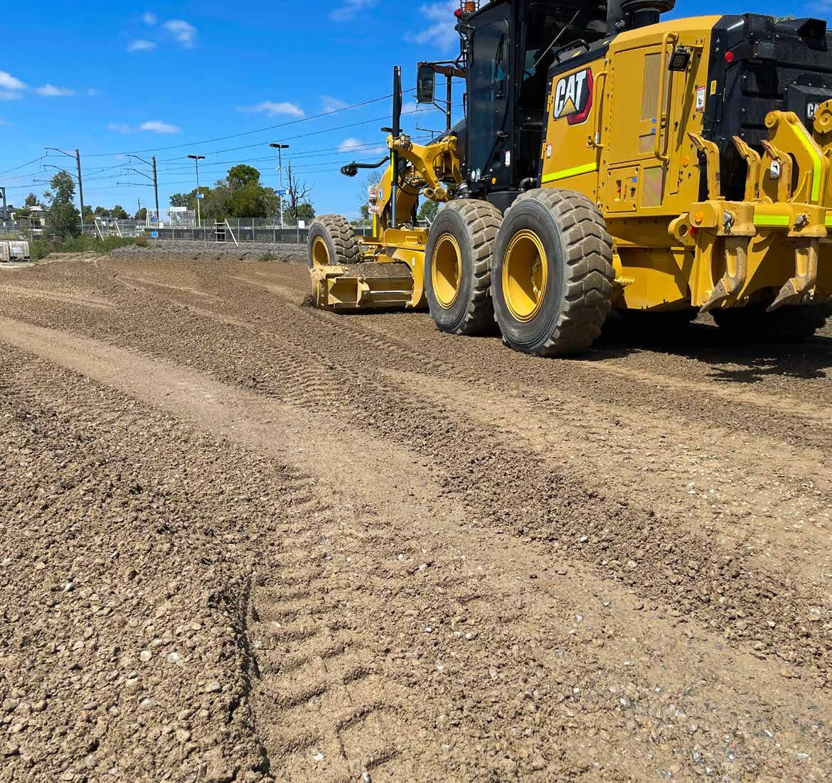 QCS CAT grader carrying out detailed road formation and earthworks