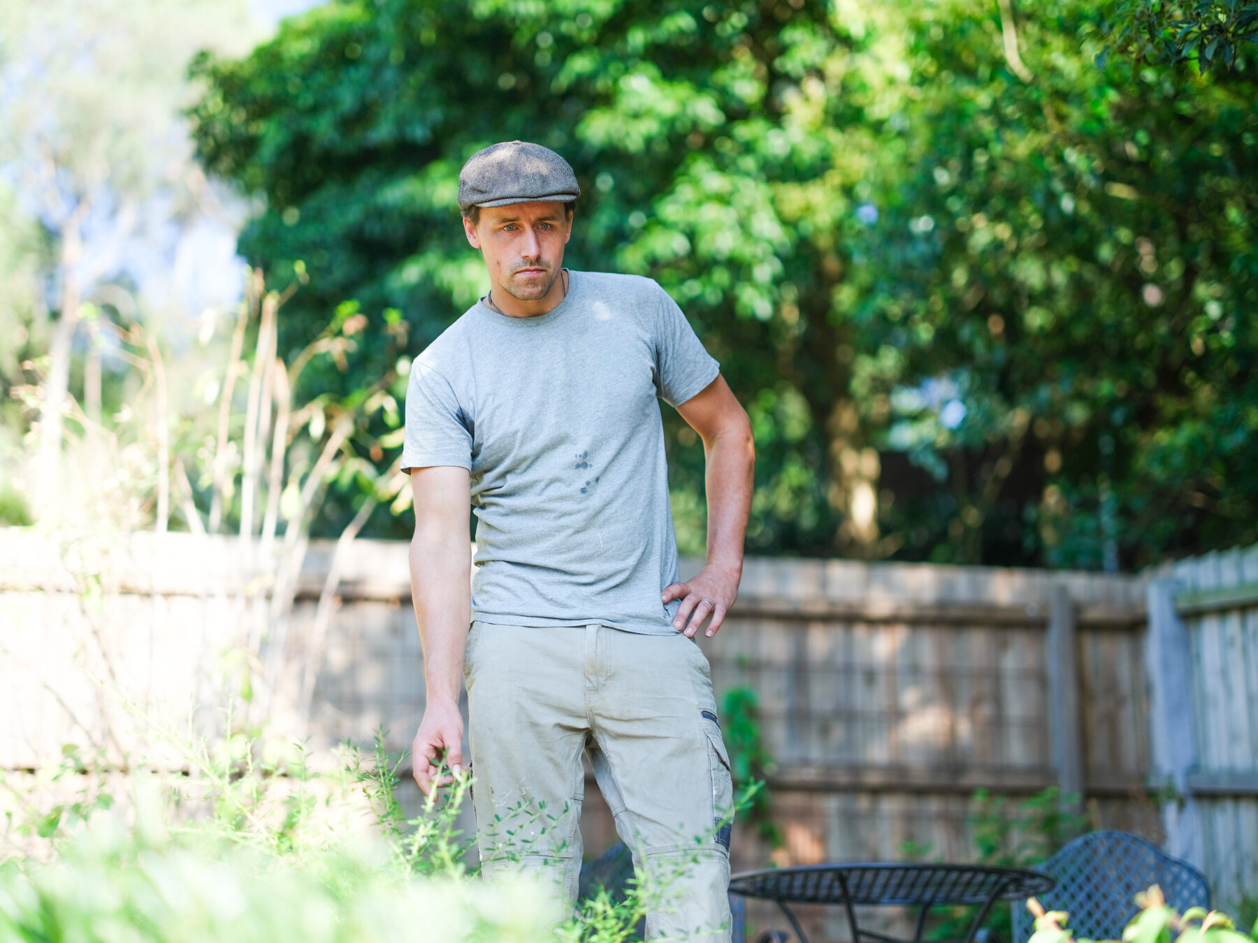 Ollie Macindoe standing in a garden he has planted
