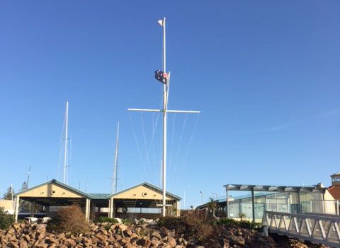 A tapered Patriot flagpole flying an Australian flag