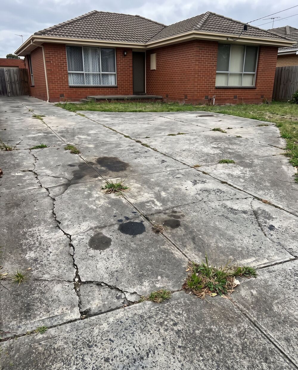Old cracked driveway before