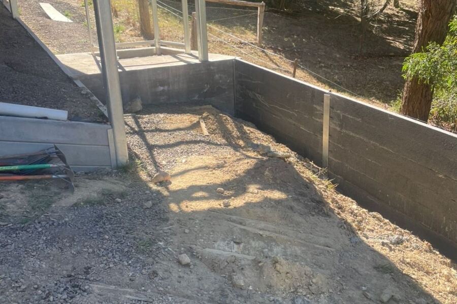 Auger post hole digging
