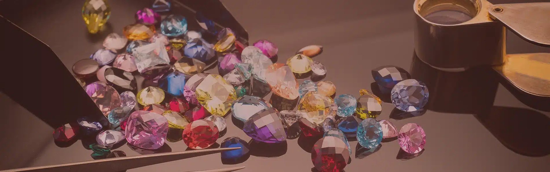 Sorted rough and cut sapphires on a merchant's desk