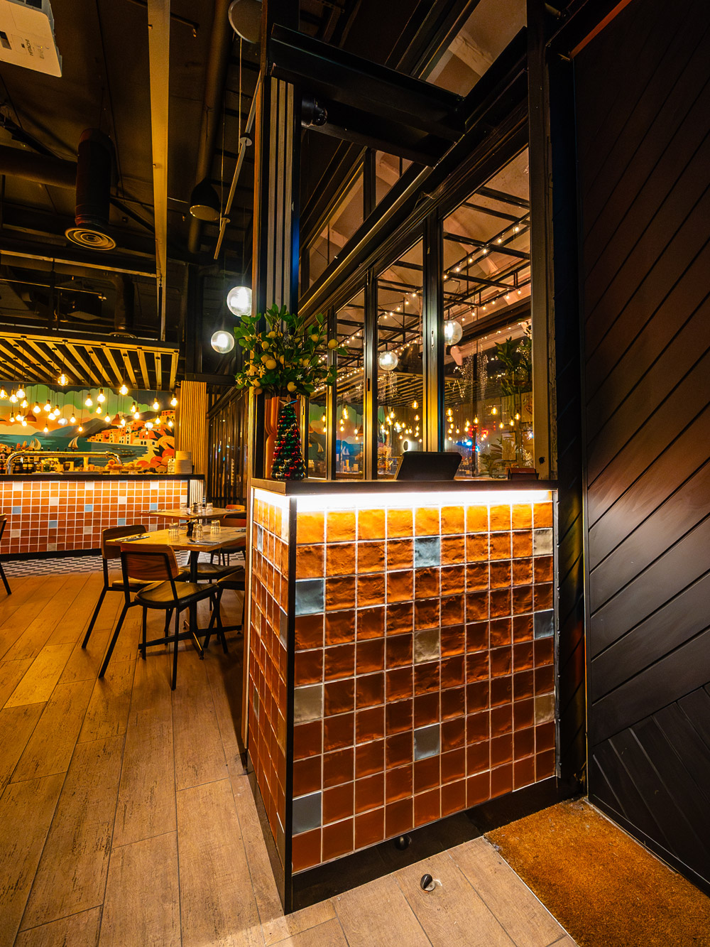 A hospitality fit out with warm timber and feature lighting