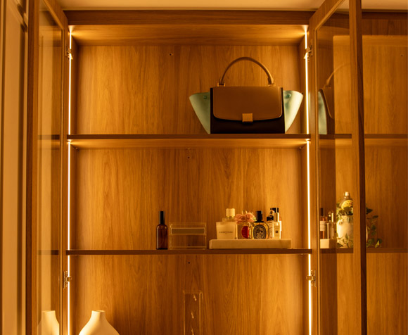 A retail fit out with warm timber joinery and feature lighting