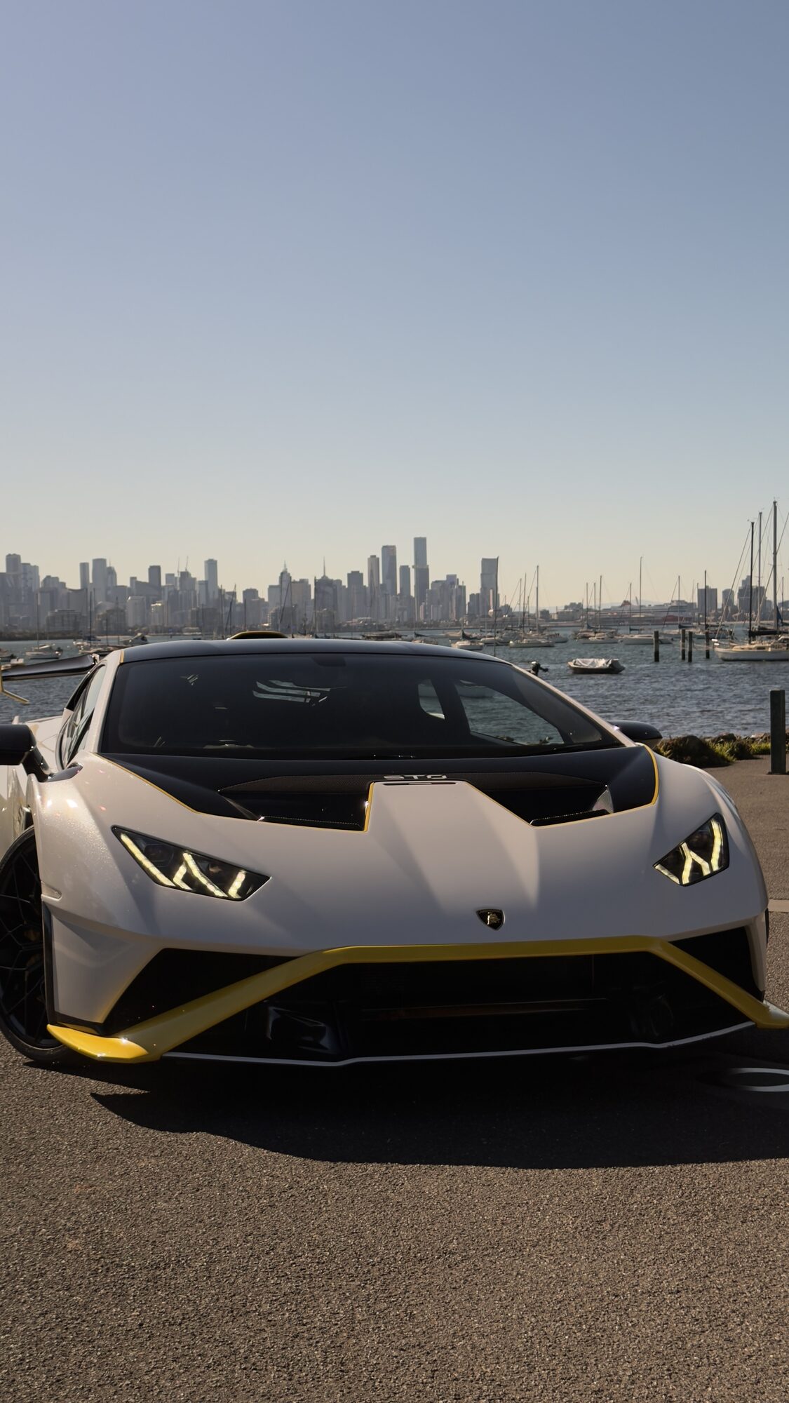 Lamborghini Huracan STO at Williamstown with the Melbourne skyline behind